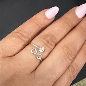 950 sterling silver infinity open ring with transparent stone Size 6